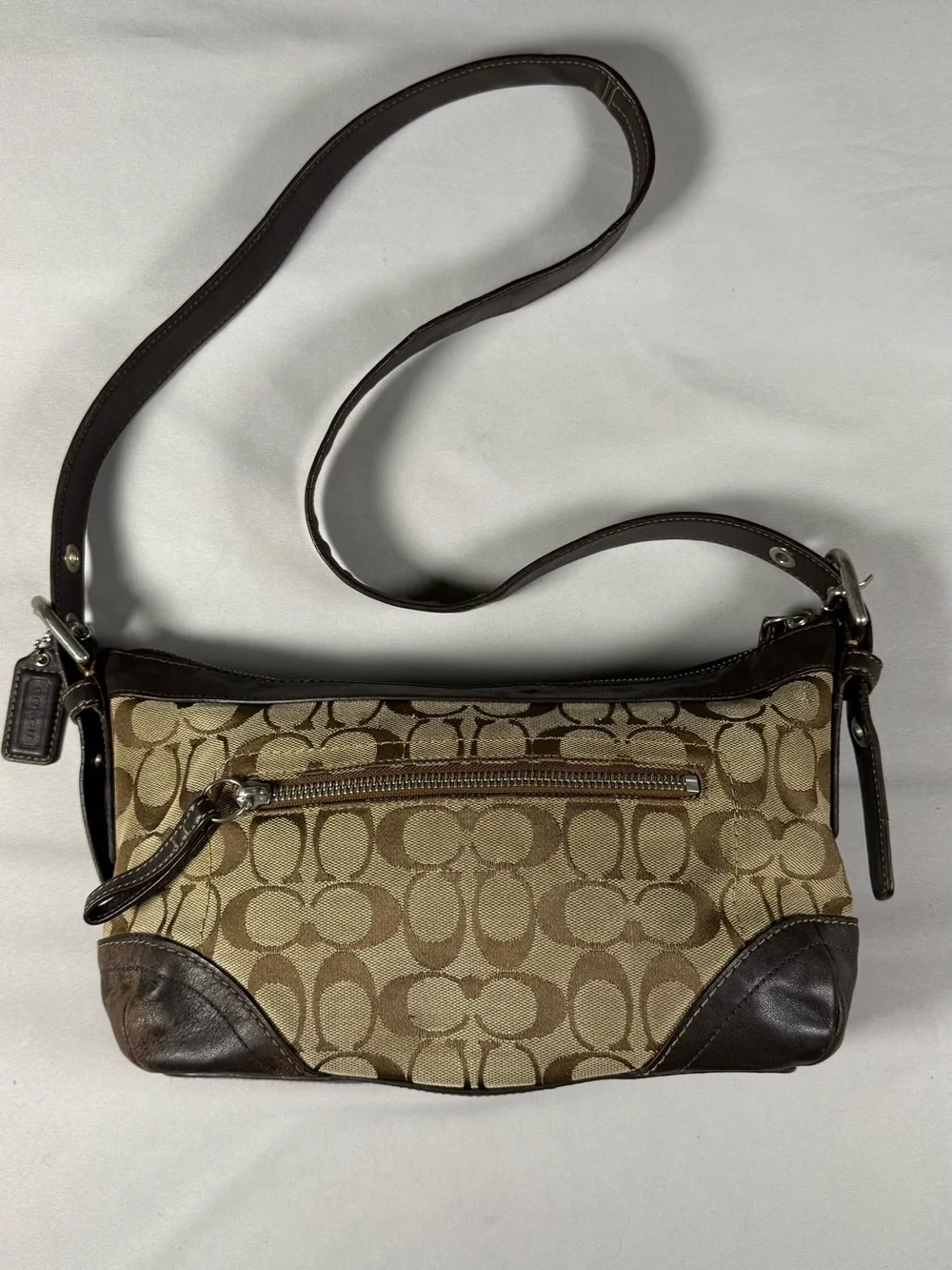 vintage Y2K-era signature canvas and leather hobo/shoulder bag